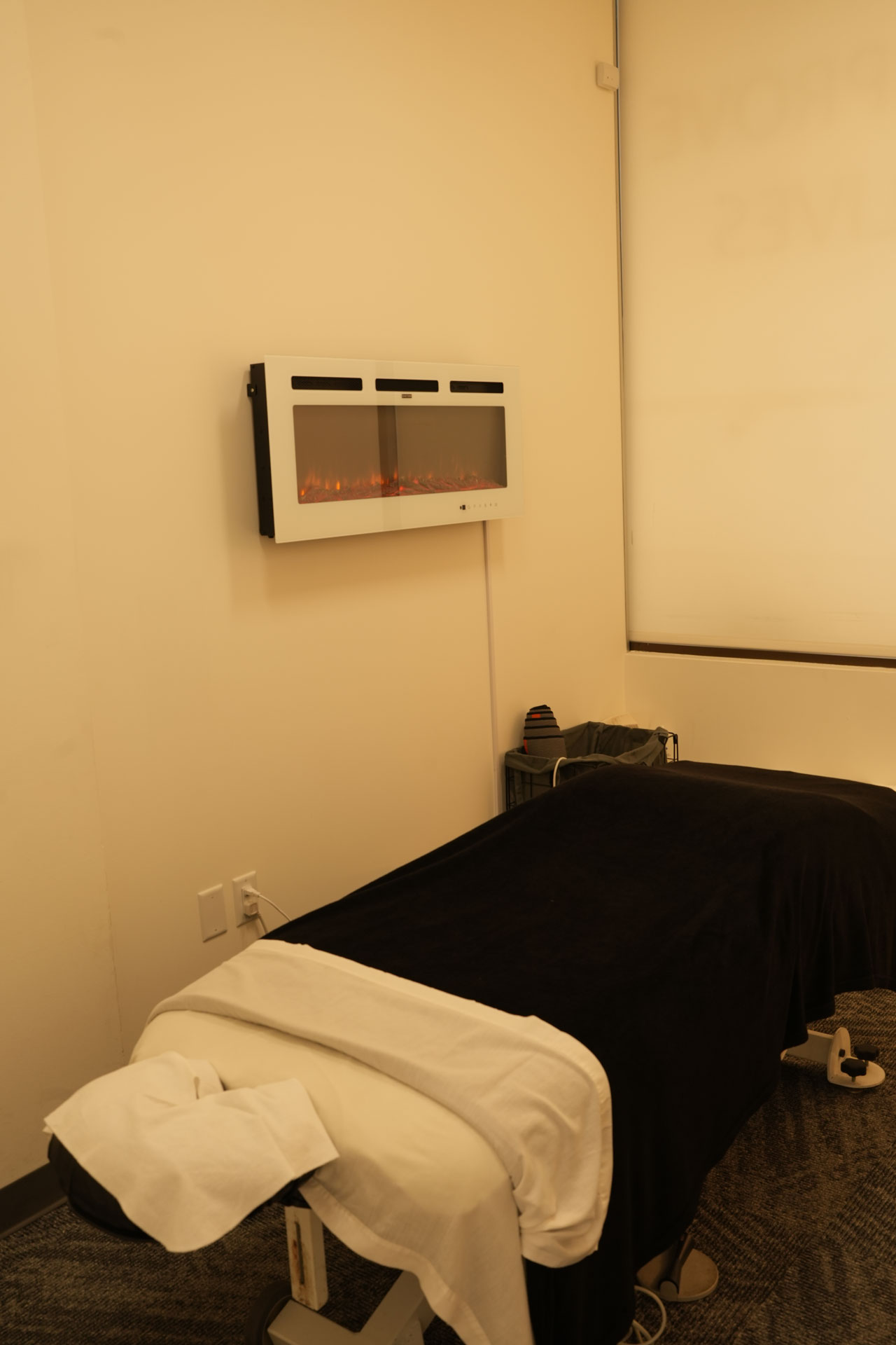 Treatment room with a massage table